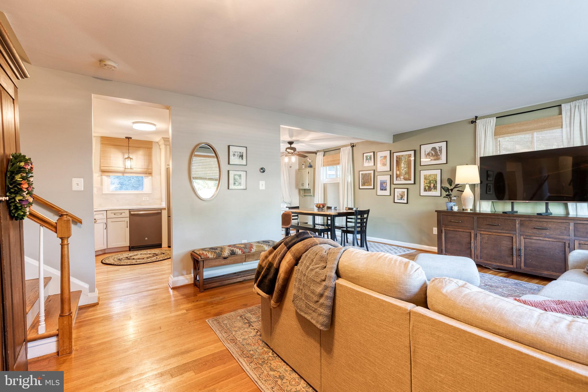1 North Hilltop Road Baltimore, MD 21228 - Photo 3 of 36 a living room with furniture and a flat screen tv