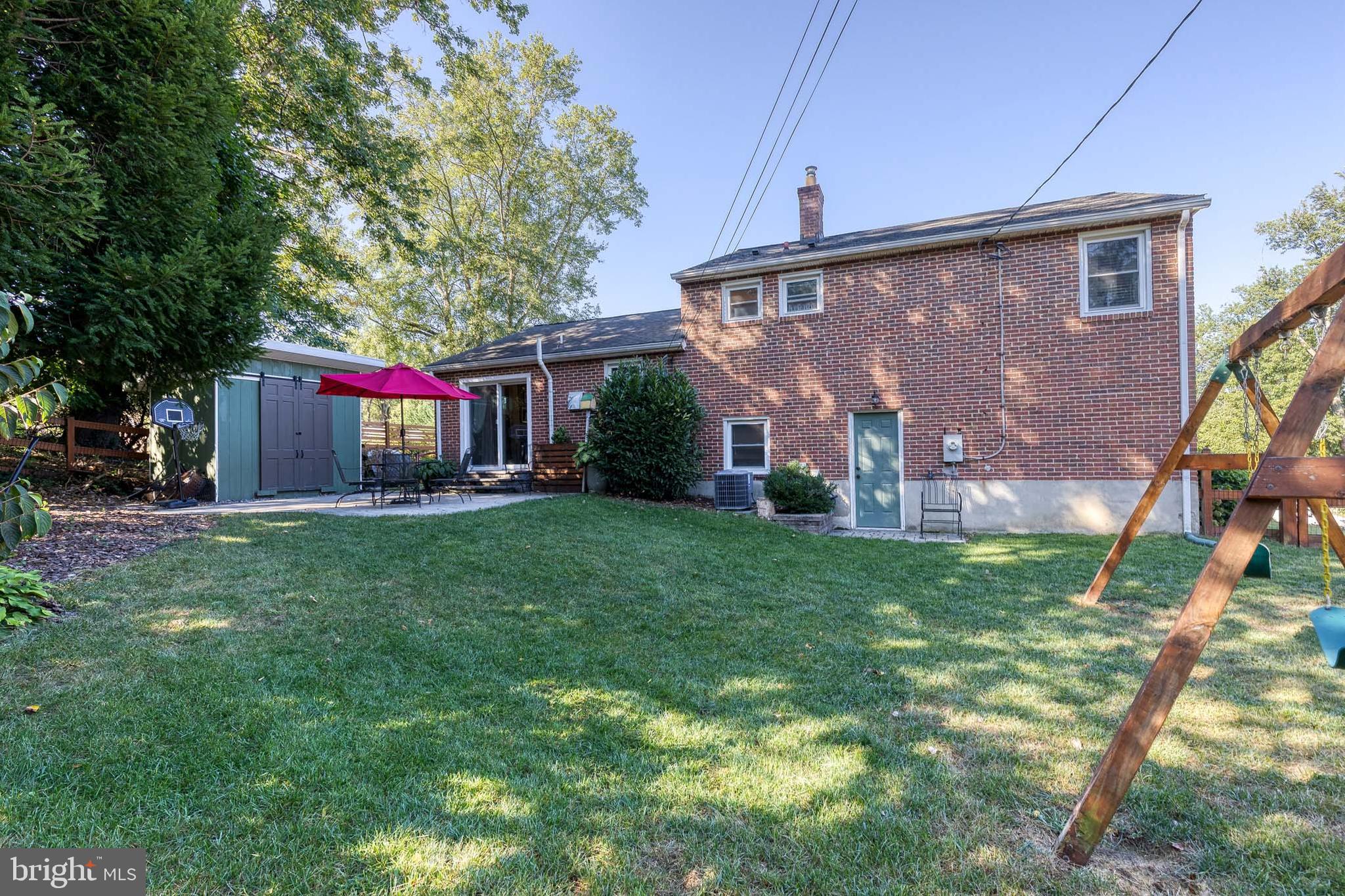 1 North Hilltop Road Baltimore, MD 21228 - Photo 35 of 36 a front view of house with yard and green space