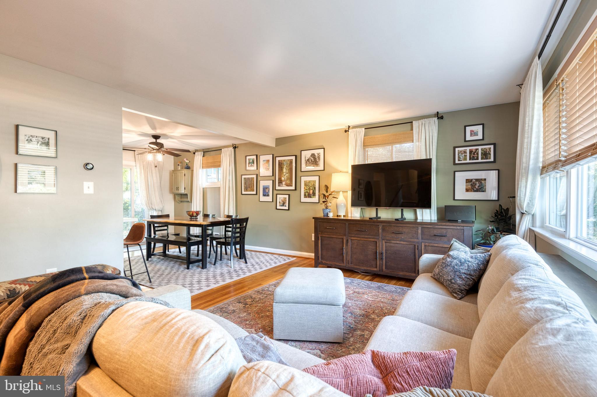 1 North Hilltop Road Baltimore, MD 21228 - Photo 4 of 36 a living room with furniture and a flat screen tv