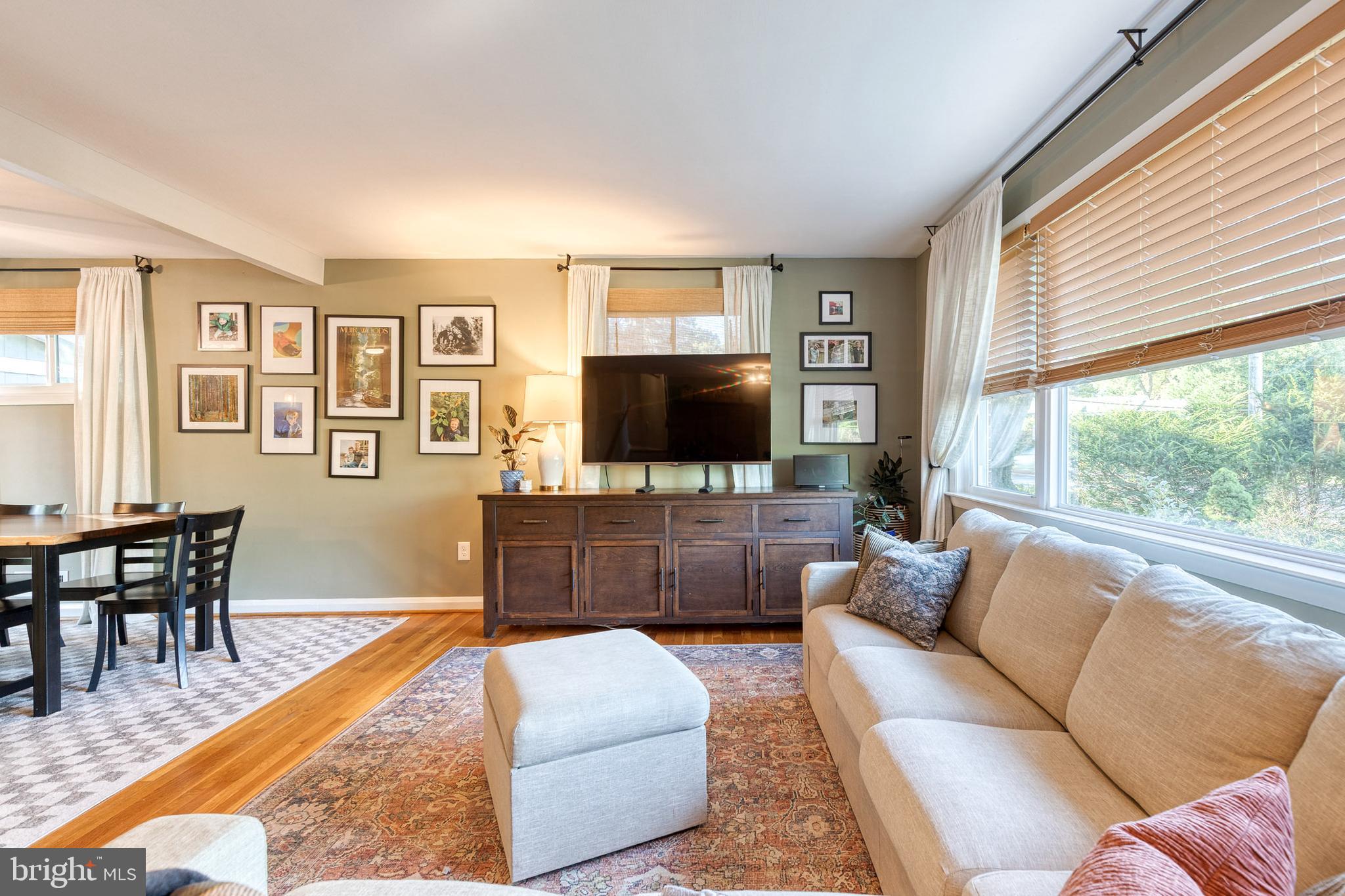 1 North Hilltop Road Baltimore, MD 21228 - Photo 6 of 36 a living room with furniture and a flat screen tv