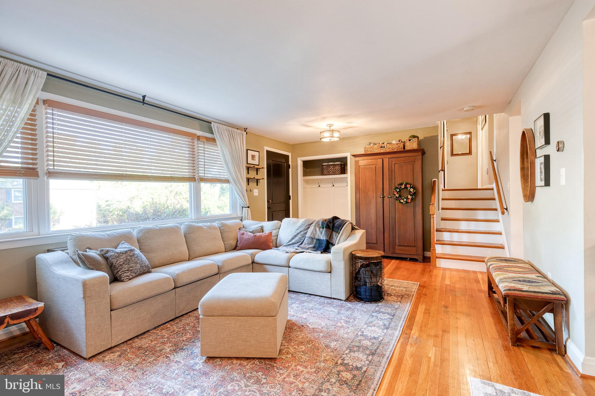 1 North Hilltop Road Baltimore, MD 21228 - Photo 8 of 36 a living room with furniture and a large window
