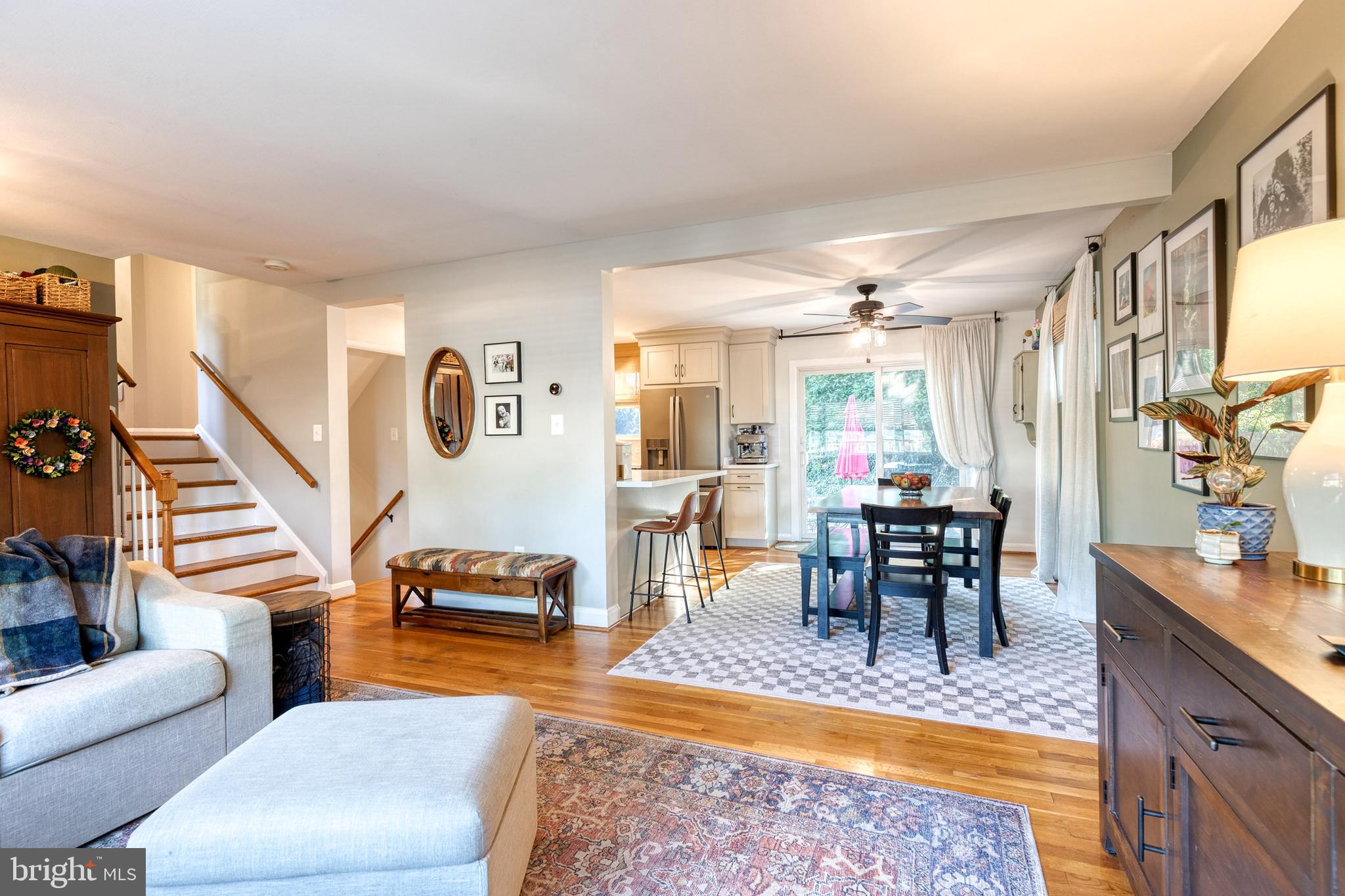 1 North Hilltop Road Baltimore, MD 21228 - Photo 10 of 36 a living room with furniture a dining table and a piano table