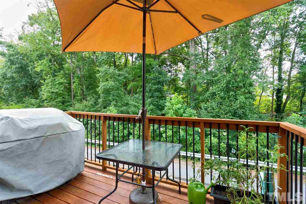 5639 Wade Park Boulevard Raleigh, NC 27607 - Photo 22 of 24 a view of a balcony with wooden floor
