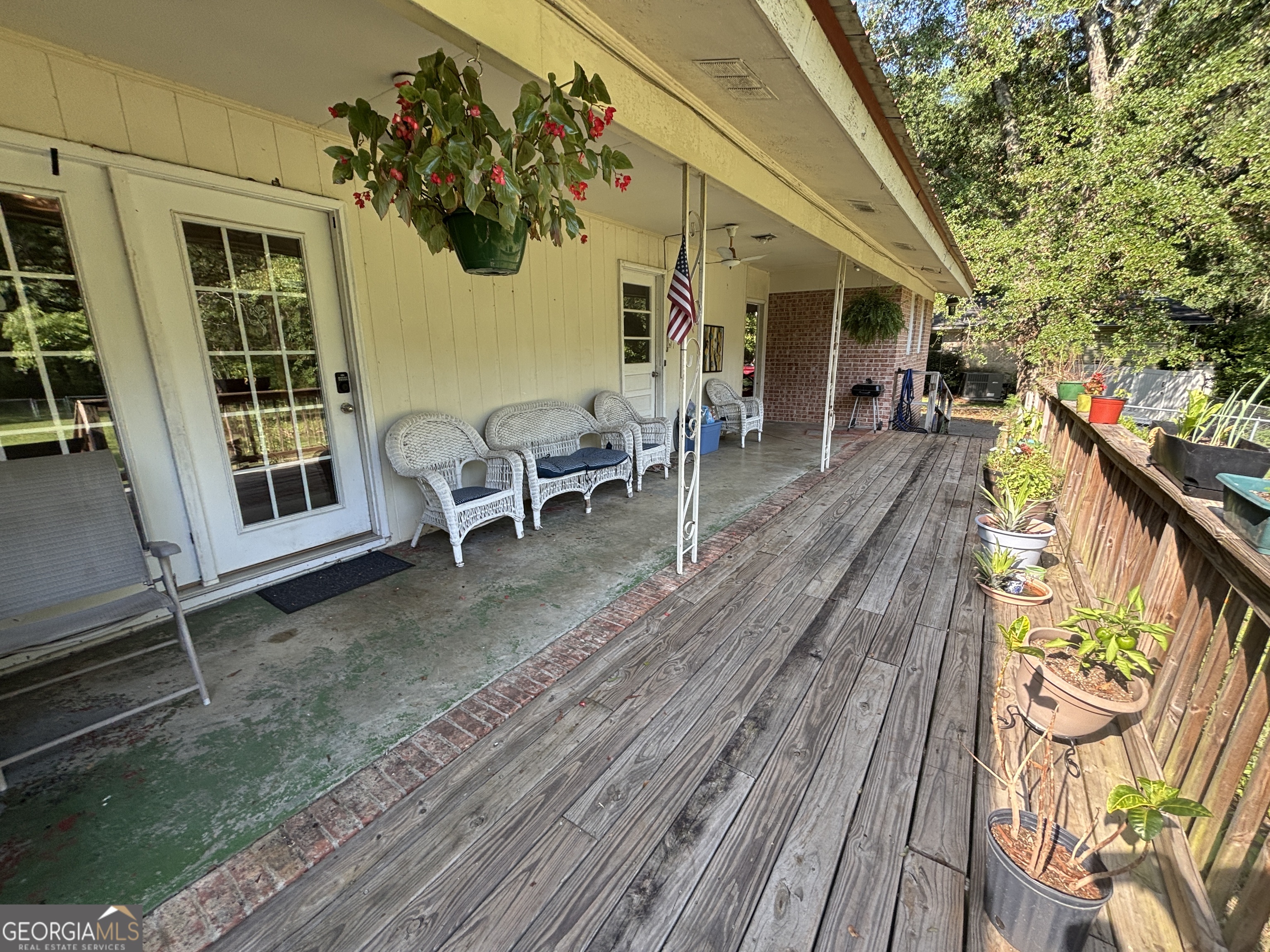 152 Crest Drive Cochran, GA 31014 - Photo 35 of 54 a view of a house with backyard and sitting area