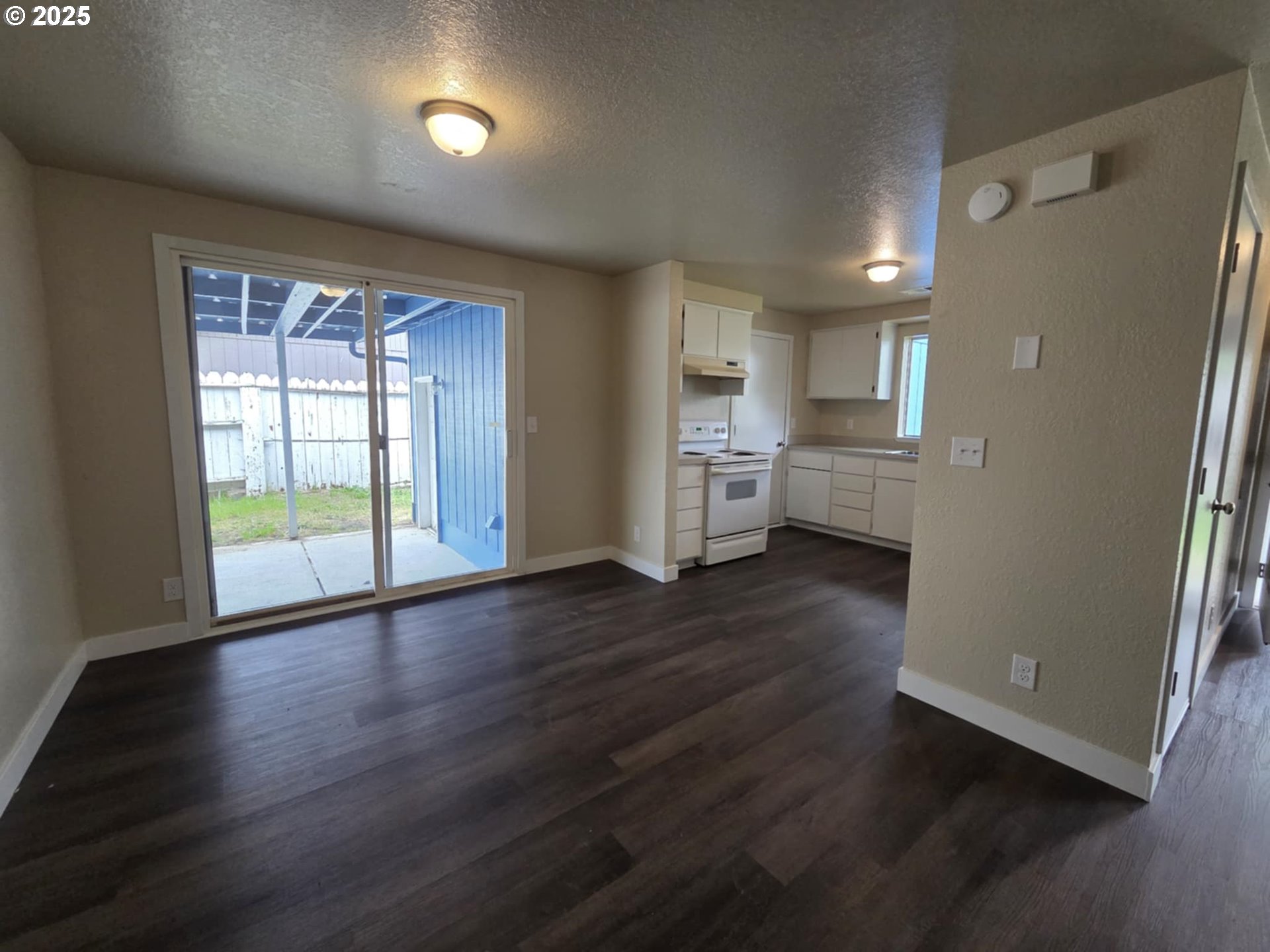 232 Columbia Loop Road Roseburg, OR 97471 - Photo 13 of 19 a view of empty room with wooden floor and fan