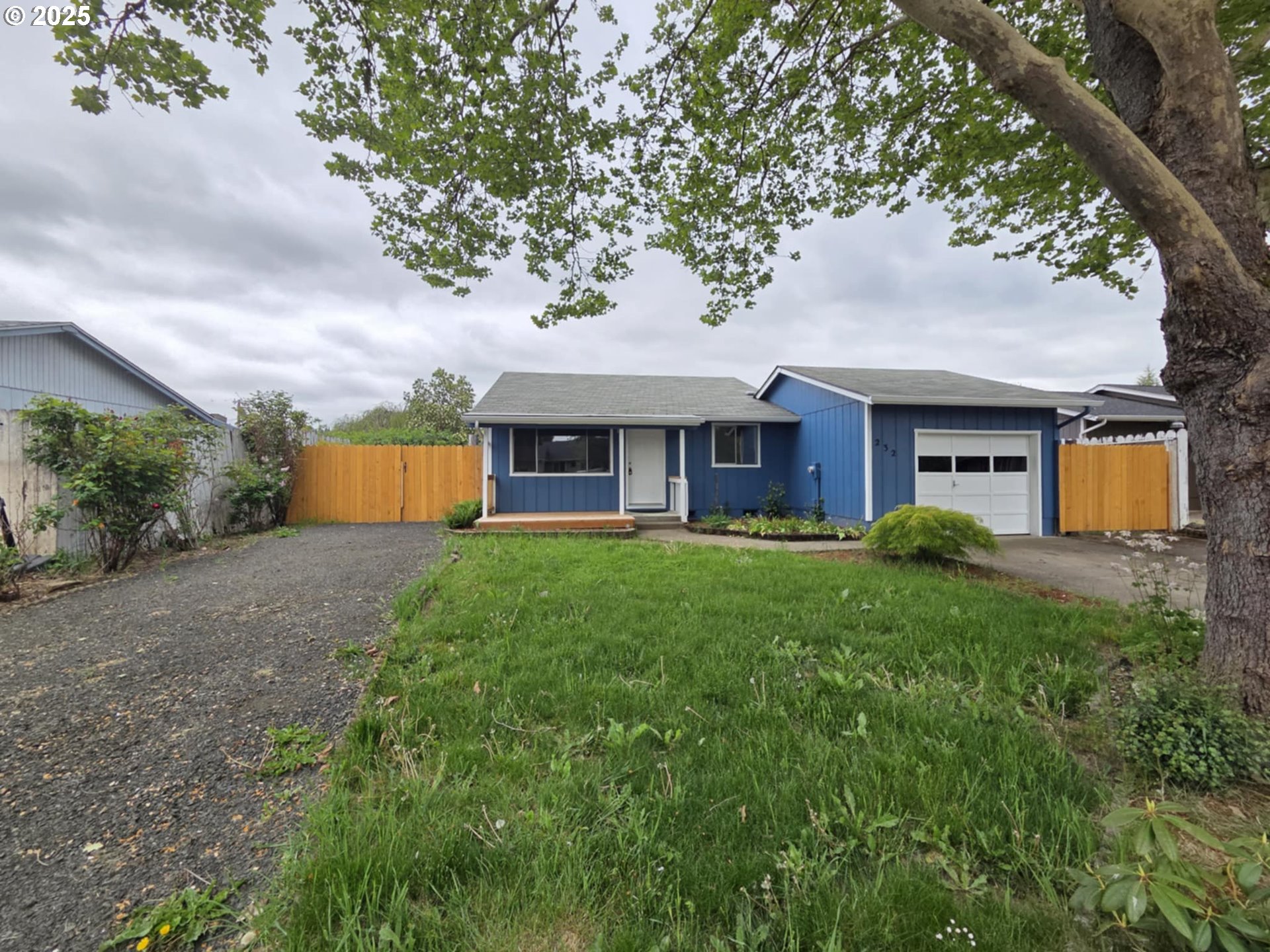 232 Columbia Loop Road Roseburg, OR 97471 - Photo 2 of 19 a view of a house with a yard