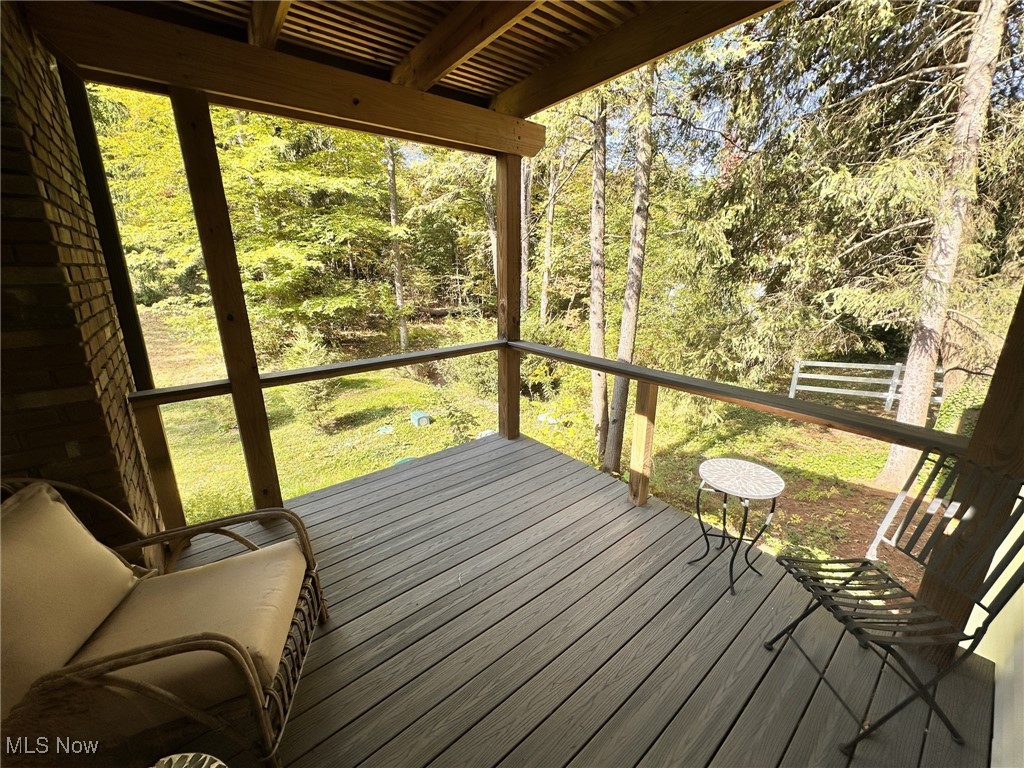 8145 Chagrin Road Chagrin Falls, OH 44023 - Photo 22 of 40 Unfurnished sunroom with plenty of natural light