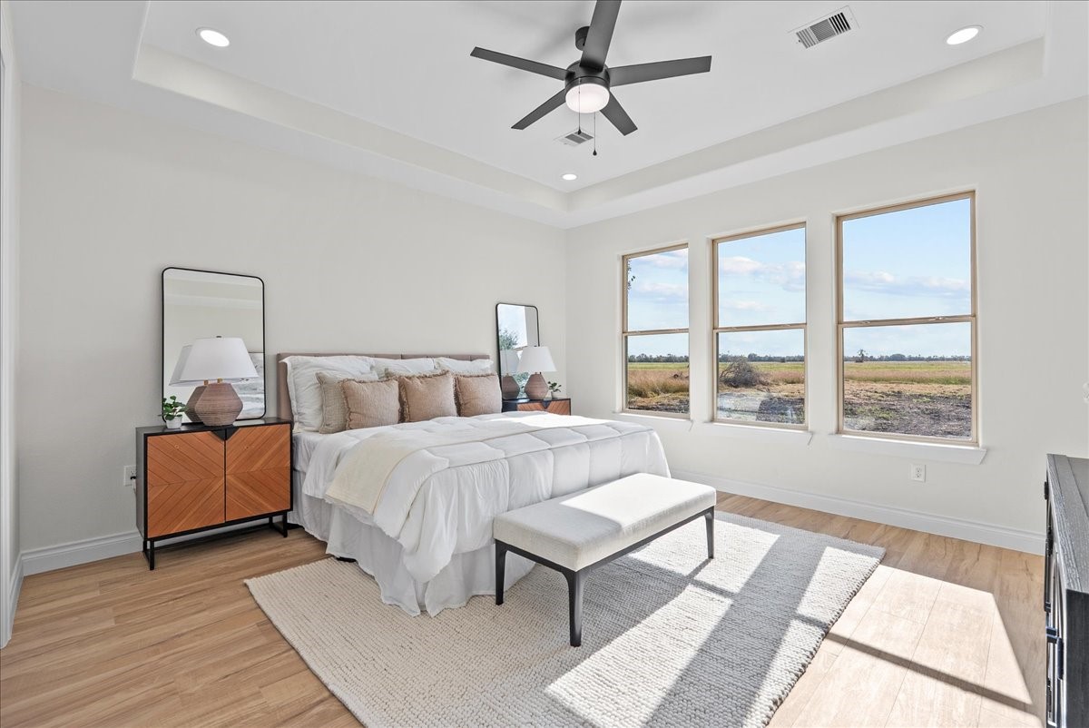 224 Cripple Creek Lane Angleton, TX 77515 - Photo 24 of 38 a bed room with bed and a window