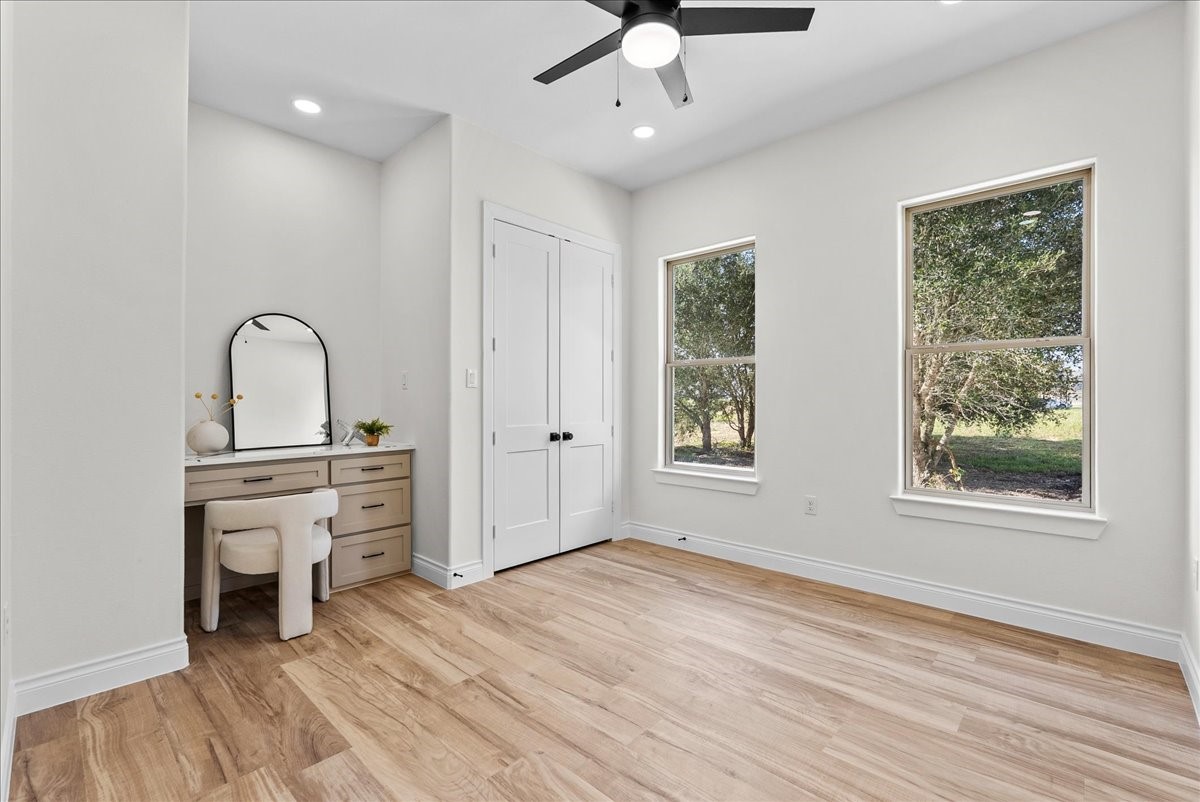 224 Cripple Creek Lane Angleton, TX 77515 - Photo 30 of 38 a view of a livingroom with furniture and wooden floor