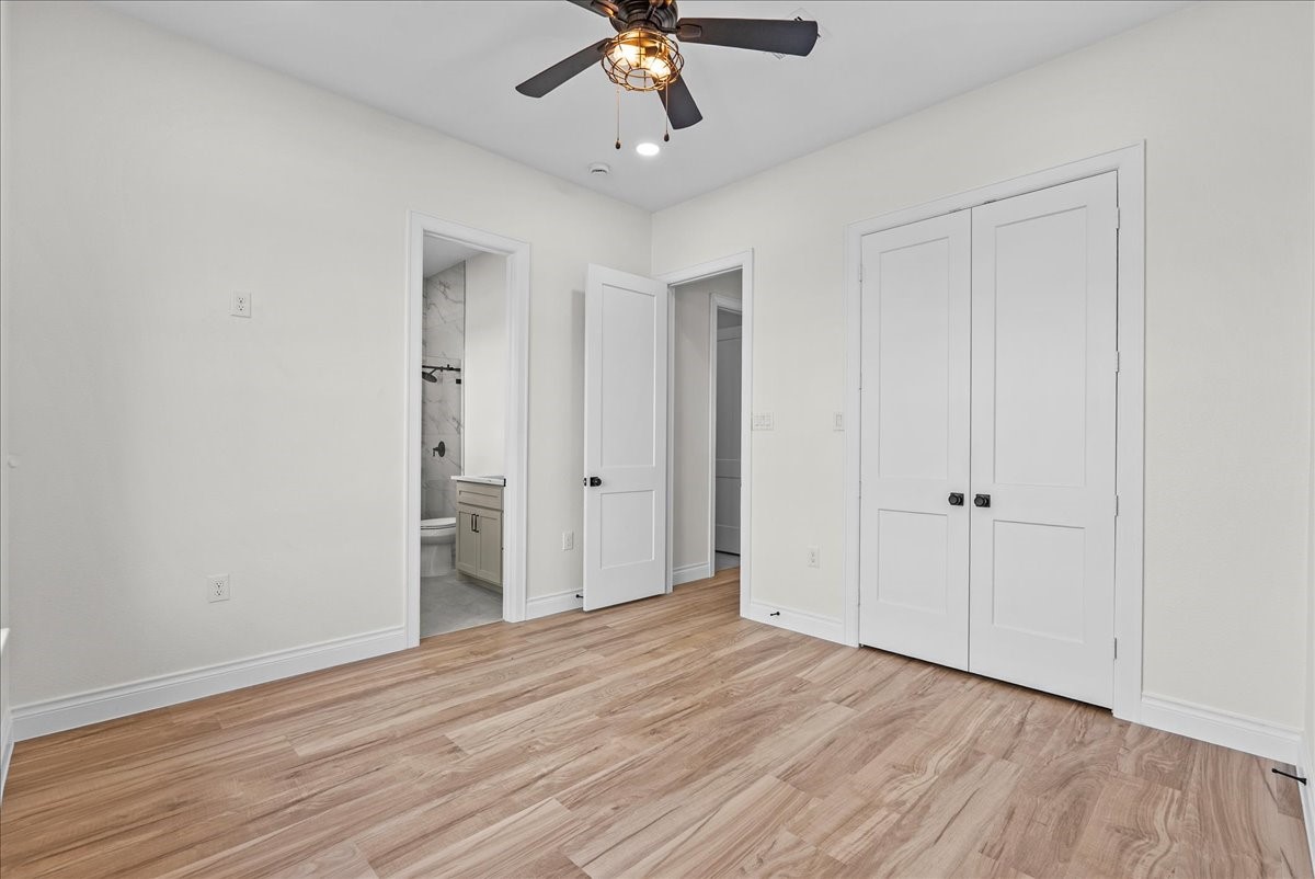 224 Cripple Creek Lane Angleton, TX 77515 - Photo 37 of 38 a view of an empty room with wooden floor