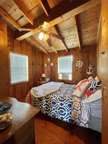 a view of room with wooden floor