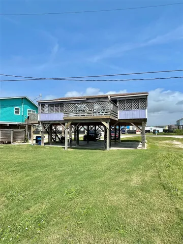 a view of a roof deck with wooden floor