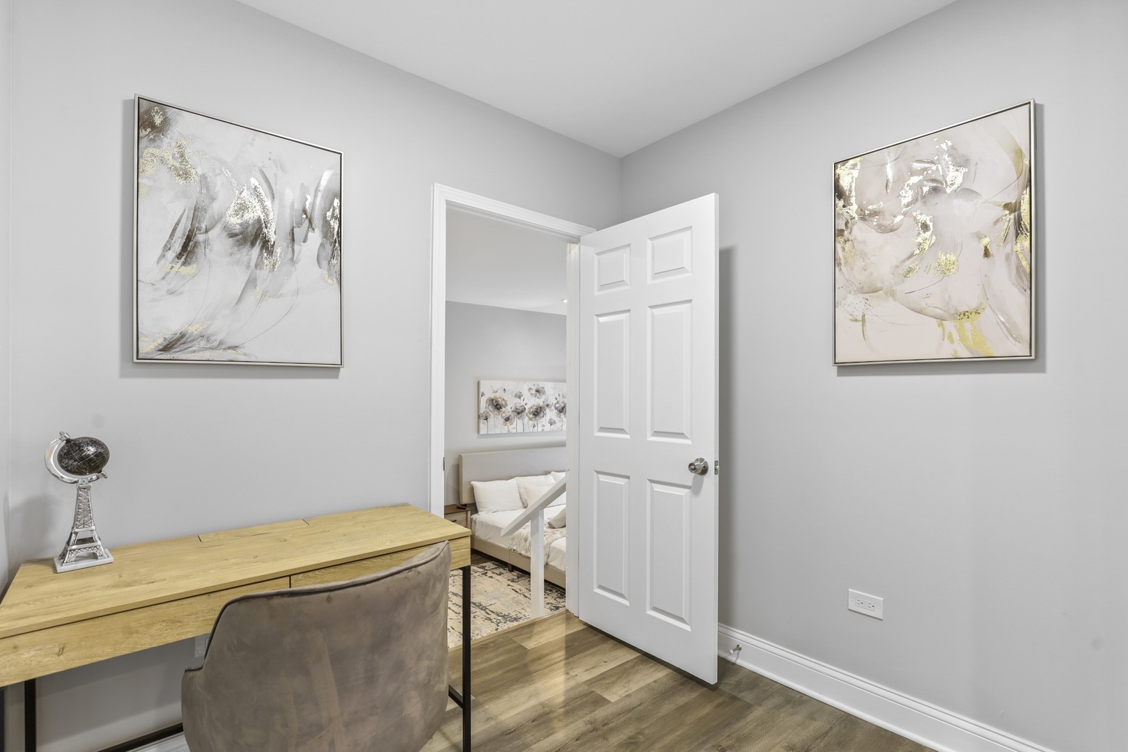 2446 North 1st Avenue River Grove, IL 60171 - Photo 15 of 31 a spacious bedroom with a bed and a desk