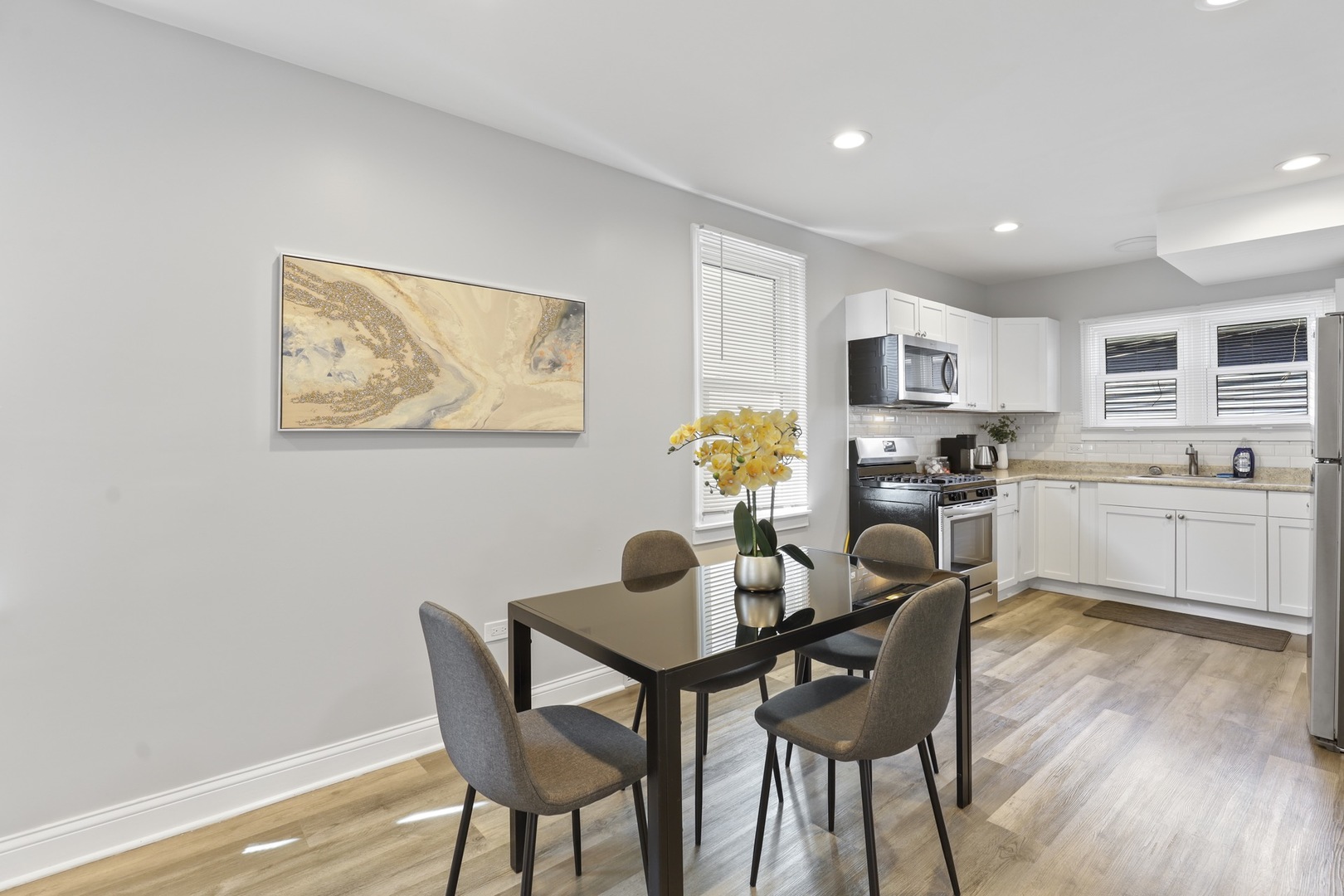 2446 North 1st Avenue River Grove, IL 60171 - Photo 16 of 31 a dining room with furniture and window