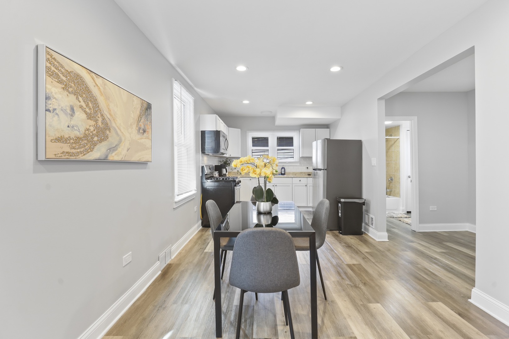 2446 North 1st Avenue River Grove, IL 60171 - Photo 17 of 31 a view of a workspace with furniture and wooden floor