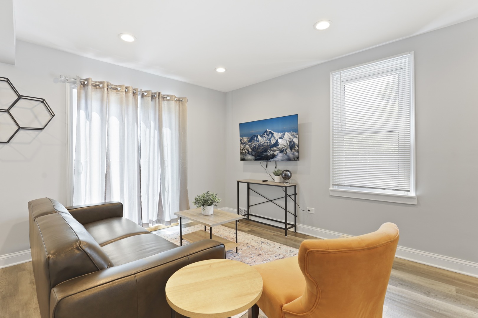 2446 North 1st Avenue River Grove, IL 60171 - Photo 20 of 31 a living room with furniture and a window