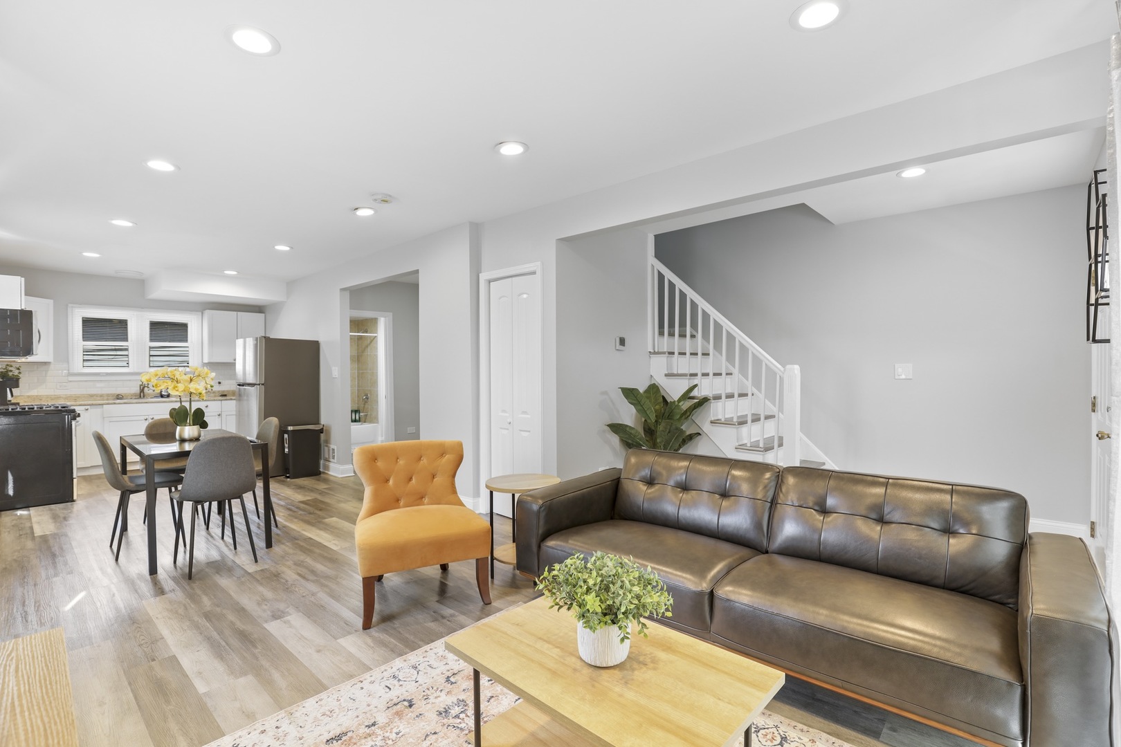 2446 North 1st Avenue River Grove, IL 60171 - Photo 22 of 31 a living room with furniture and wooden floor