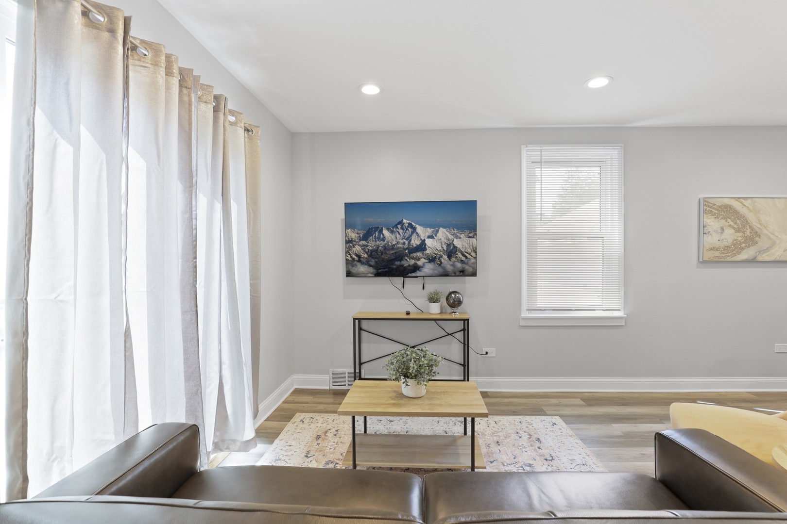 2446 North 1st Avenue River Grove, IL 60171 - Photo 24 of 31 a living room with furniture and a window