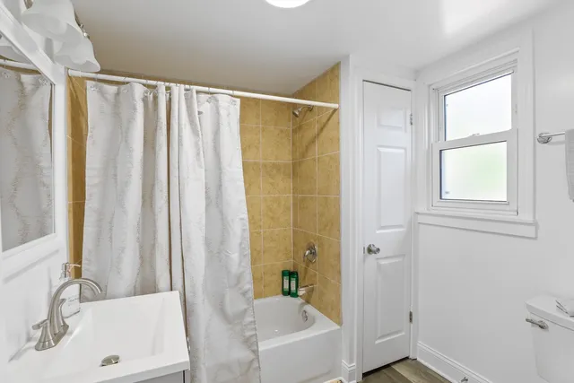 a bathroom with a sink and a tub