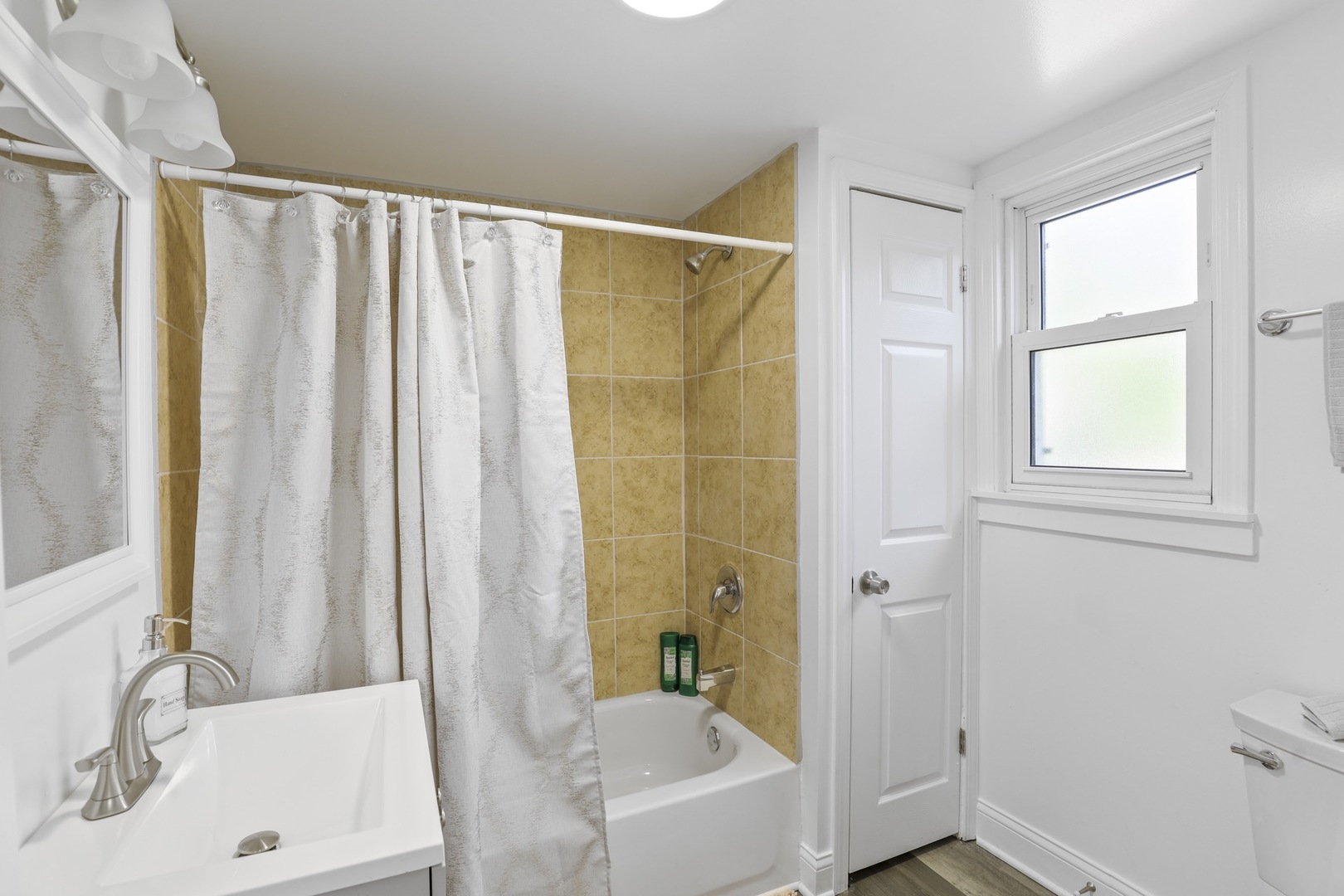 2446 North 1st Avenue River Grove, IL 60171 - Photo 25 of 31 a bathroom with a sink and a tub
