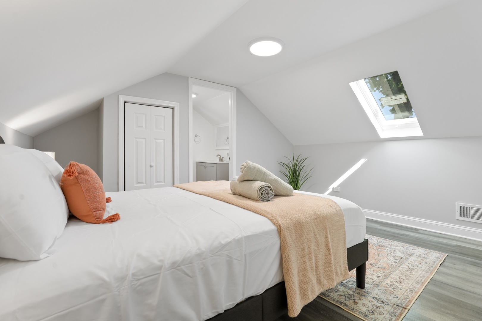 2446 North 1st Avenue River Grove, IL 60171 - Photo 3 of 31 a bedroom with a bed and wooden floor