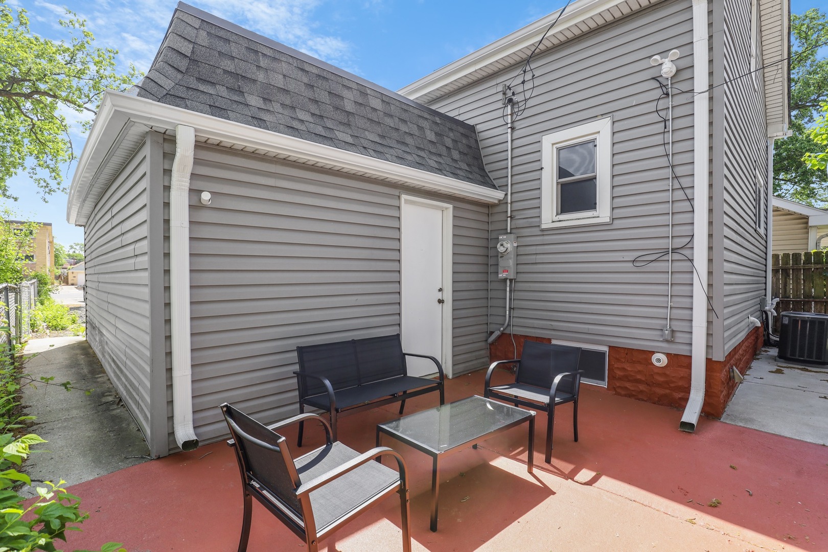 2446 North 1st Avenue River Grove, IL 60171 - Photo 31 of 31 a backyard of a house with outdoor seating