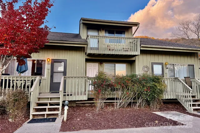 a front view of a house with a porch