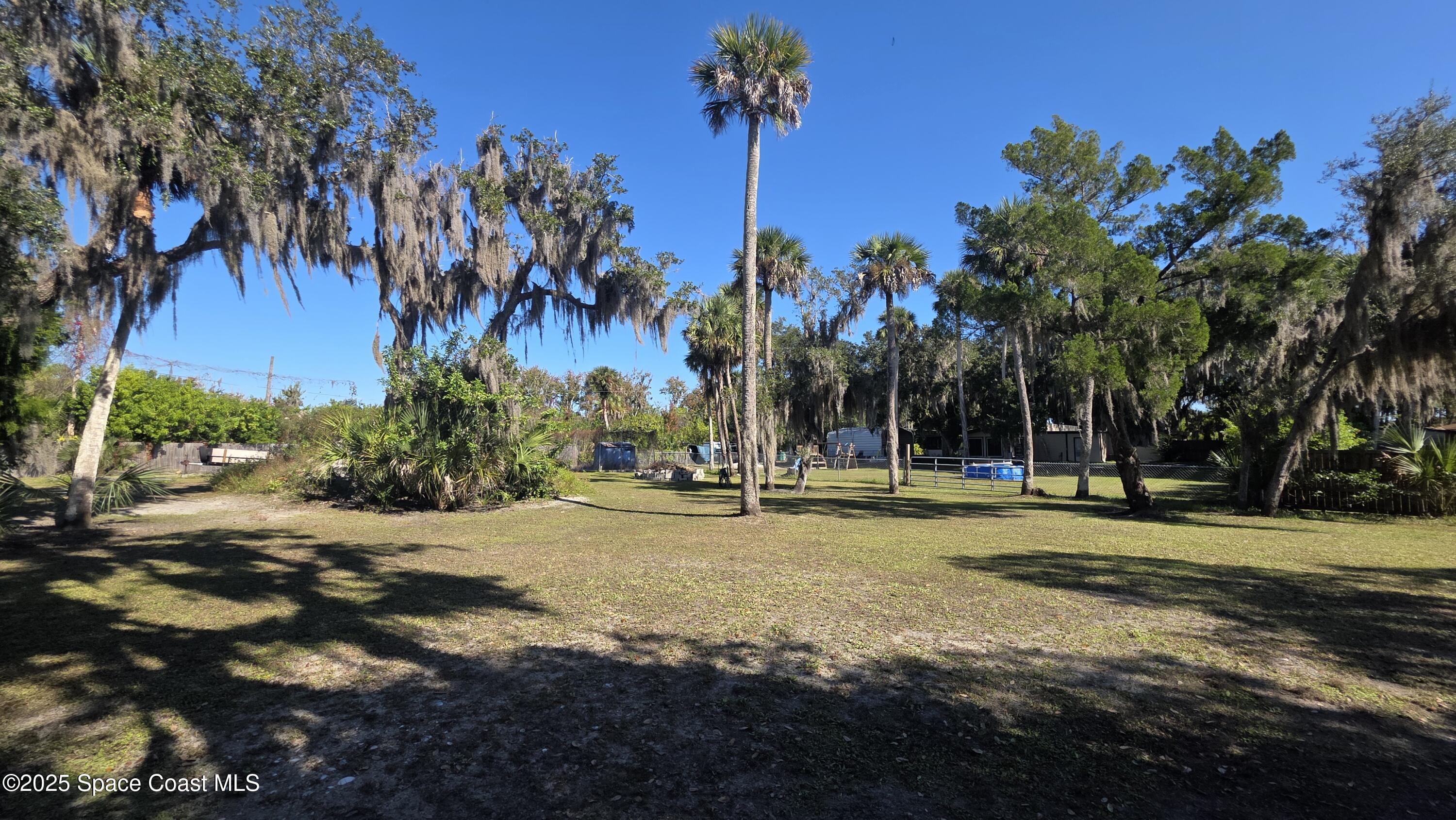 875 Pine Island Road Merritt Island, FL 32953 - Photo 13 of 24 a view of a playground with green space