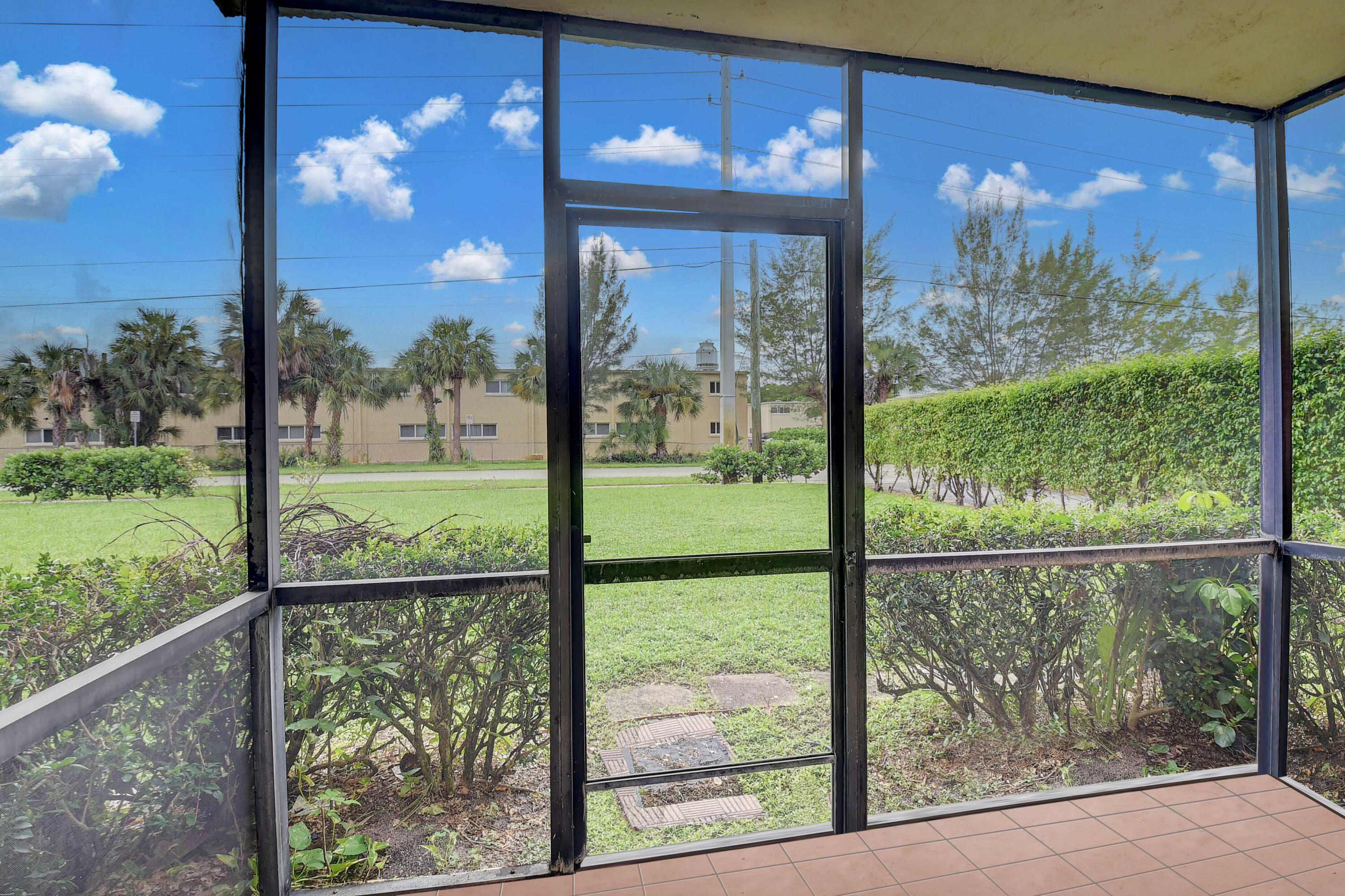 460 Northwest 20th Street, Unit 1060 Boca Raton, FL 33431 - Photo 12 of 12 Screened in Lanai