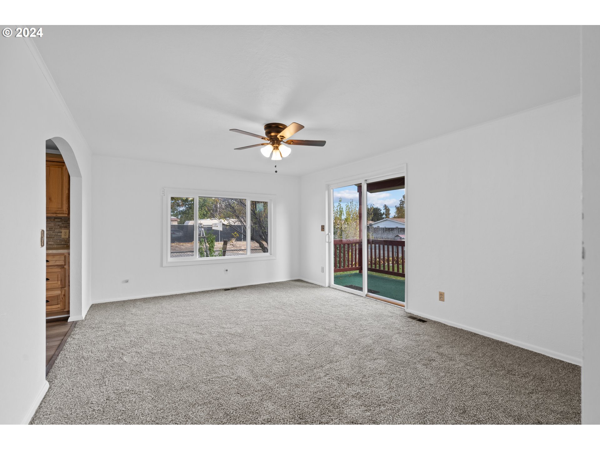 1655 Northeast 2nd Street Hermiston, OR 97838 - Photo 15 of 43 a view of room with window and ceiling fan