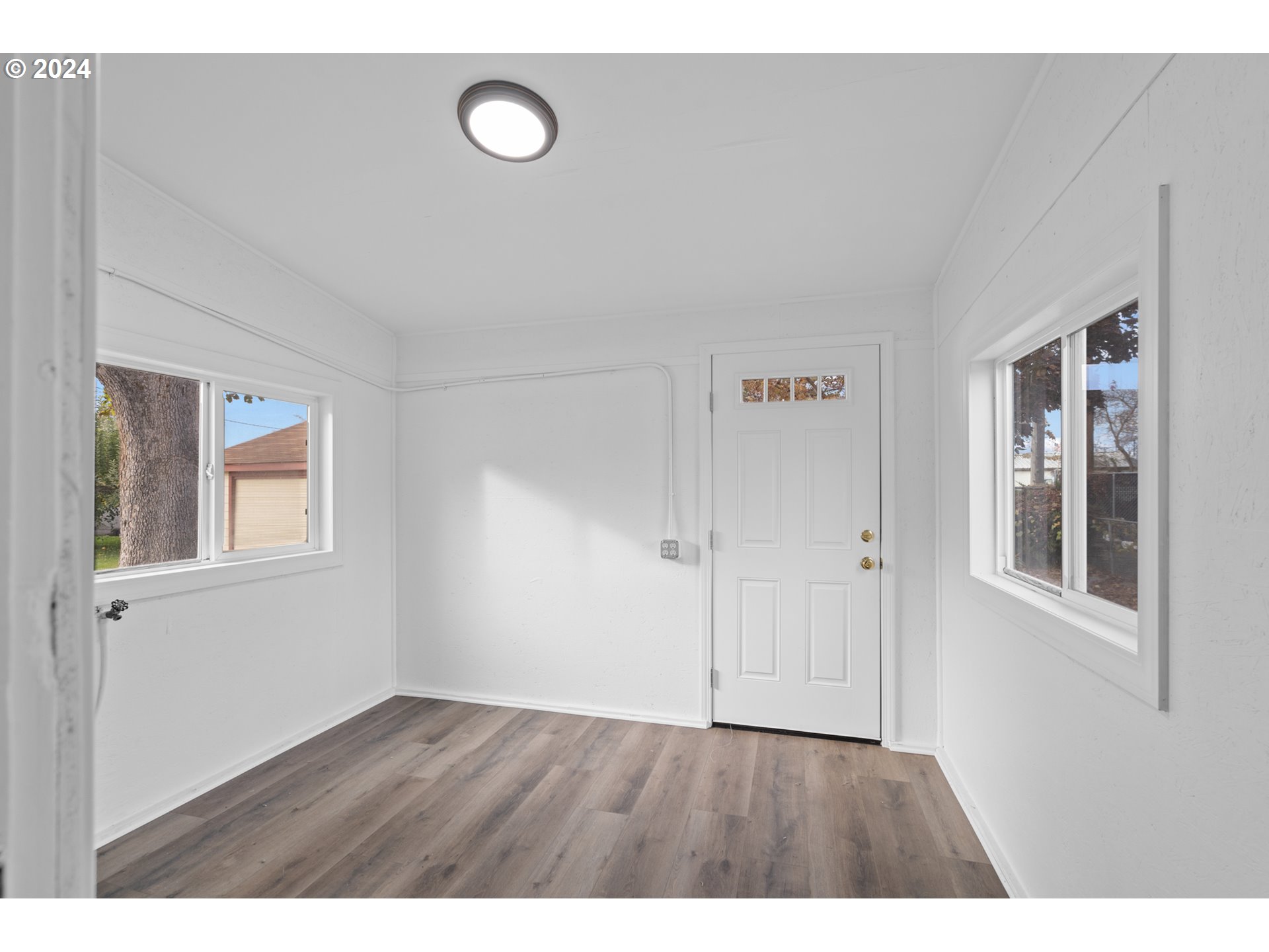 1655 Northeast 2nd Street Hermiston, OR 97838 - Photo 23 of 43 a view of an empty room with window and closet area