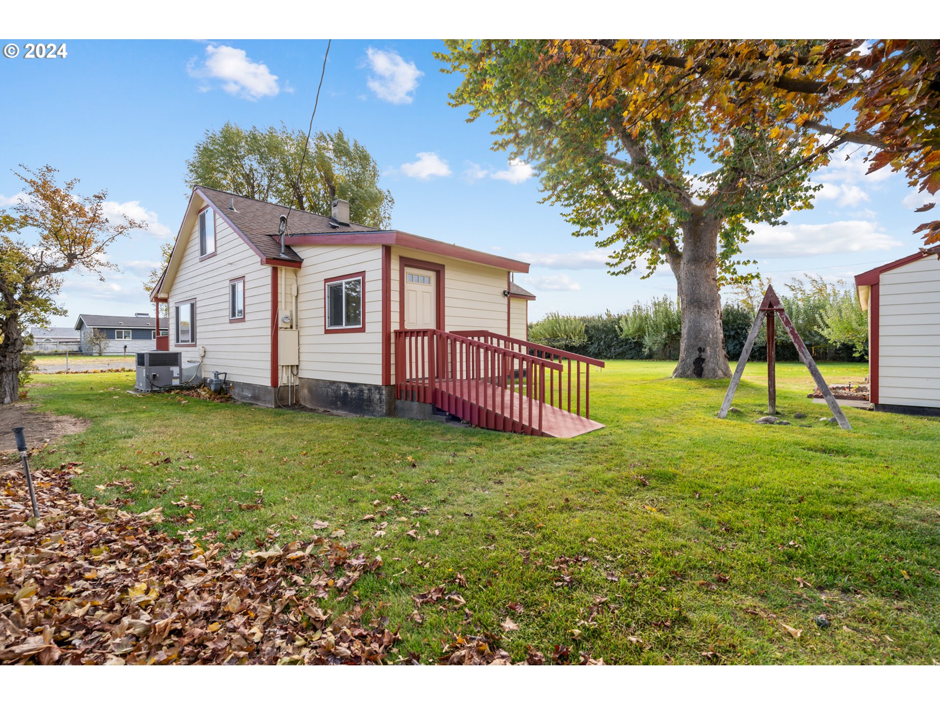 1655 Northeast 2nd Street Hermiston, OR 97838 - Photo 5 of 43 a view of a house with a backyard