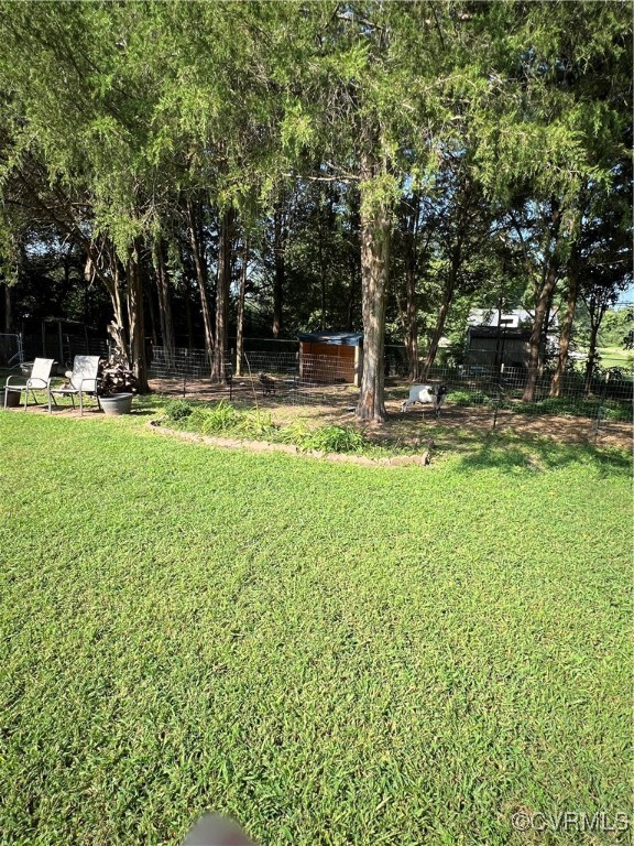 255 Rainwater Drive Aylett, VA 23009 - Photo 16 of 30 a view of a yard with a trees