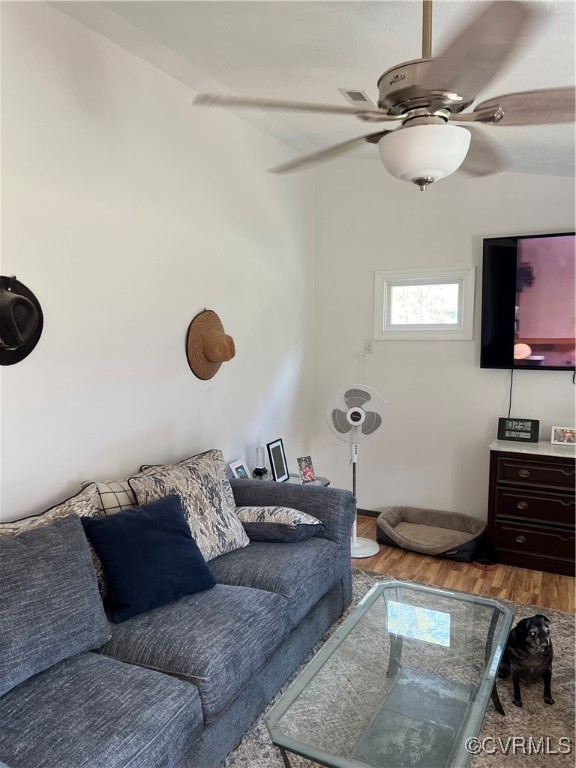 255 Rainwater Drive Aylett, VA 23009 - Photo 18 of 30 a living room with furniture and a flat screen tv