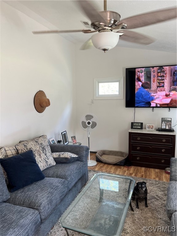 255 Rainwater Drive Aylett, VA 23009 - Photo 19 of 30 a living room with furniture and a flat screen tv
