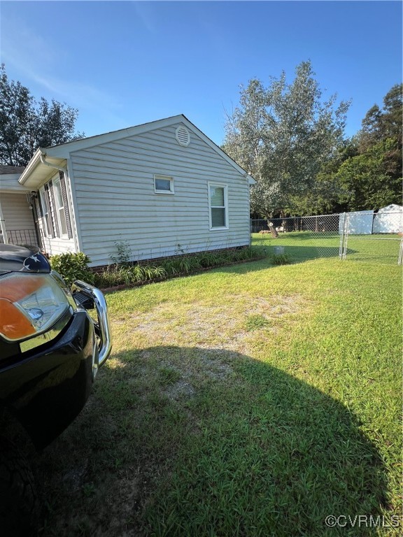255 Rainwater Drive Aylett, VA 23009 - Photo 4 of 30 a view of back yard of the house