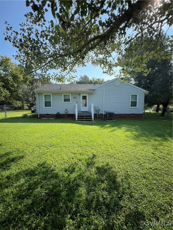 255 Rainwater Drive Aylett, VA 23009 - Photo 9 of 30 an outdoor view of house with yard and trees in the background
