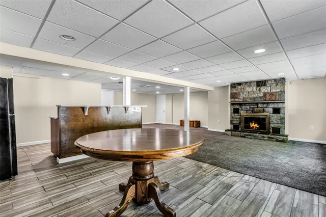 a kitchen with a stove and a refrigerator