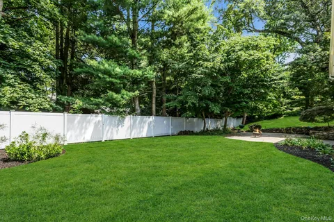 a view of swimming pool with outdoor seating