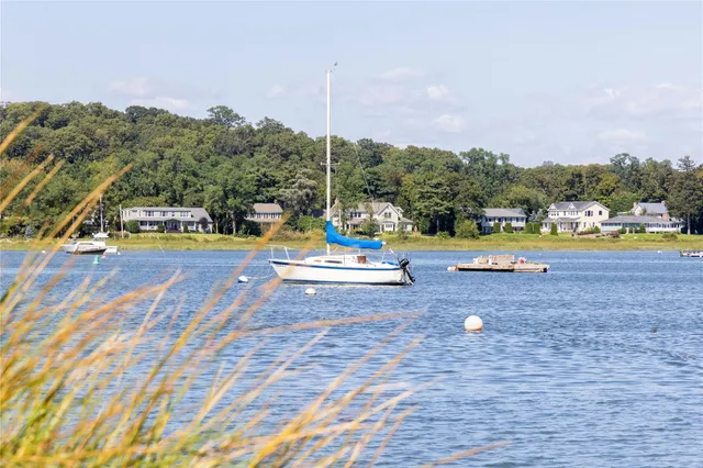 a view of swimming pool with a lake view