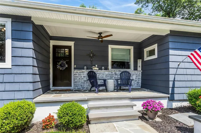 a view of building with outdoor seating