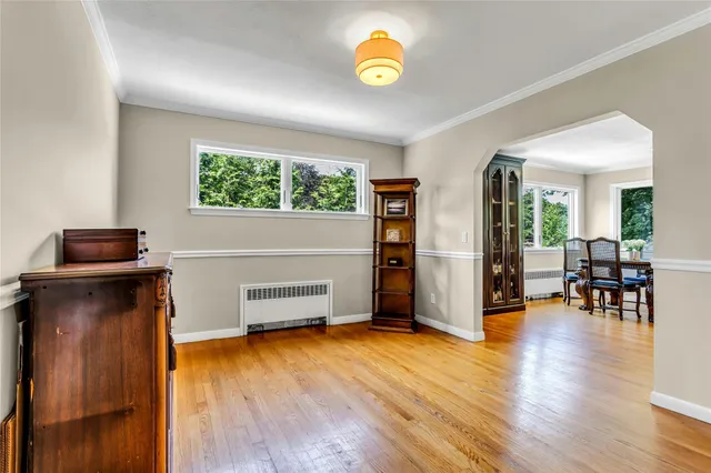 a view of a livingroom with furniture and wooden floor