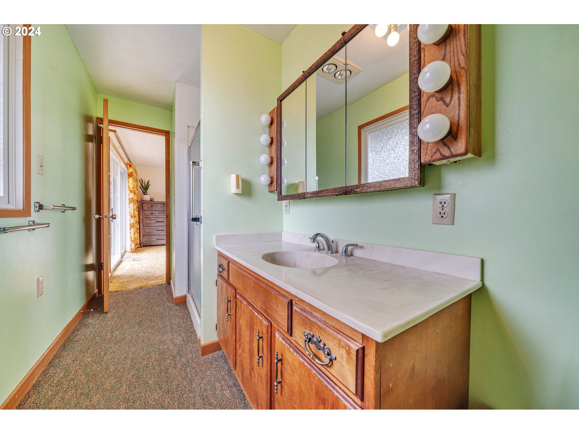 33821 Southeast Gunderson Road Sandy, OR 97055 - Photo 14 of 44 a bathroom with a sink and a mirror