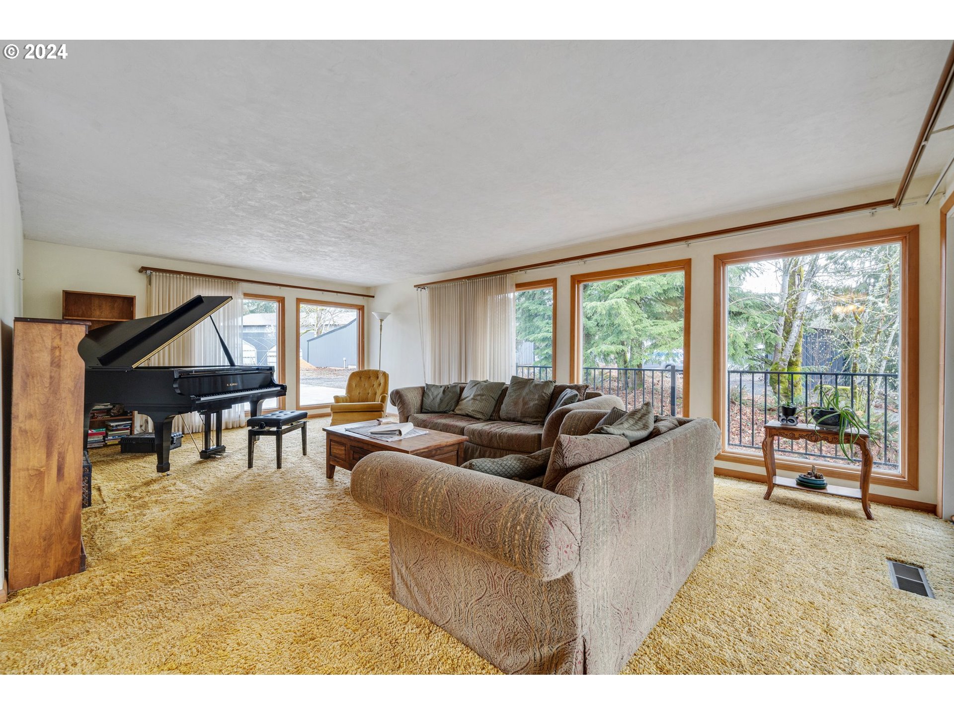 33821 Southeast Gunderson Road Sandy, OR 97055 - Photo 10 of 44 a living room with furniture and a large window