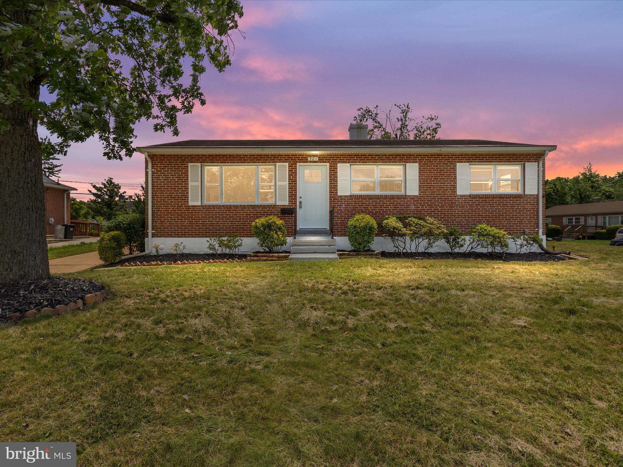 901 Vanderwood Road Baltimore, MD 21228 - Photo 1 of 43 a front view of a house with a yard