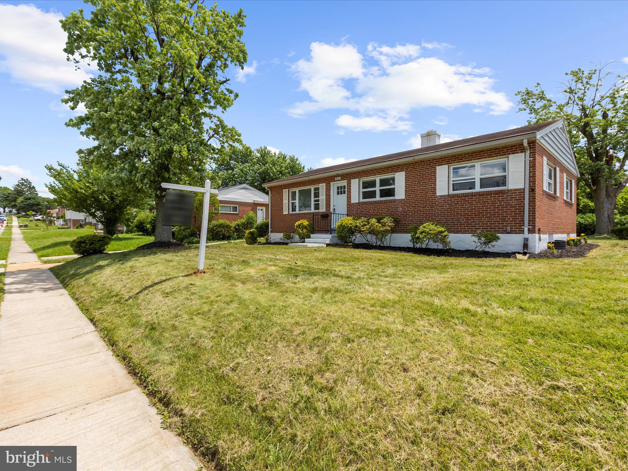 901 Vanderwood Road Baltimore, MD 21228 - Photo 41 of 43 a front view of a house with a yard