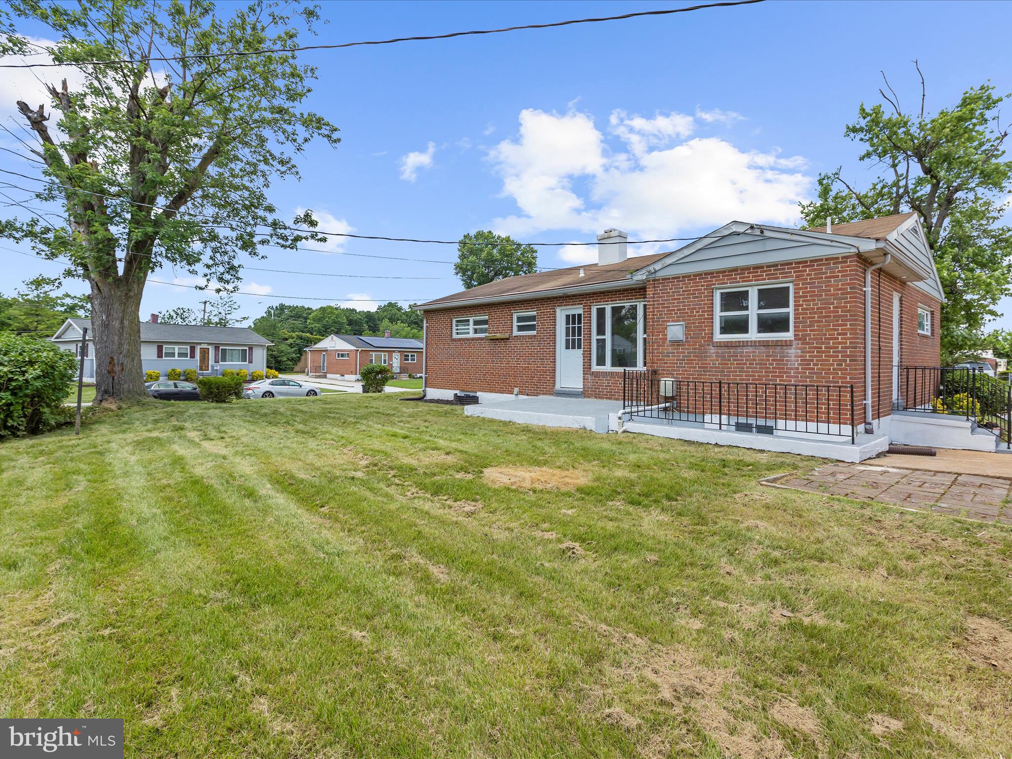 901 Vanderwood Road Baltimore, MD 21228 - Photo 42 of 43 a view of a house with a backyard