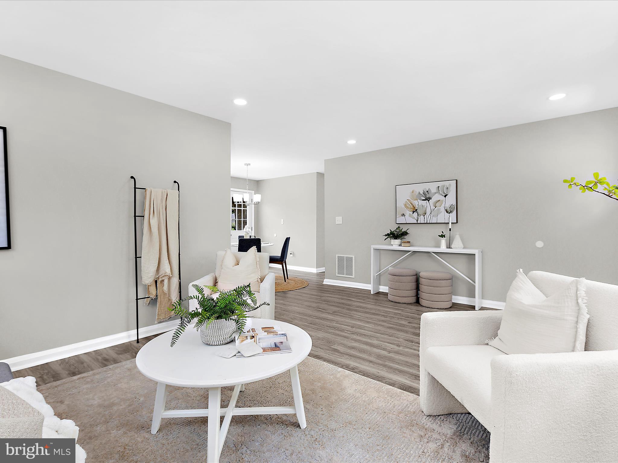 901 Vanderwood Road Baltimore, MD 21228 - Photo 6 of 43 a living room with furniture potted plant and a table