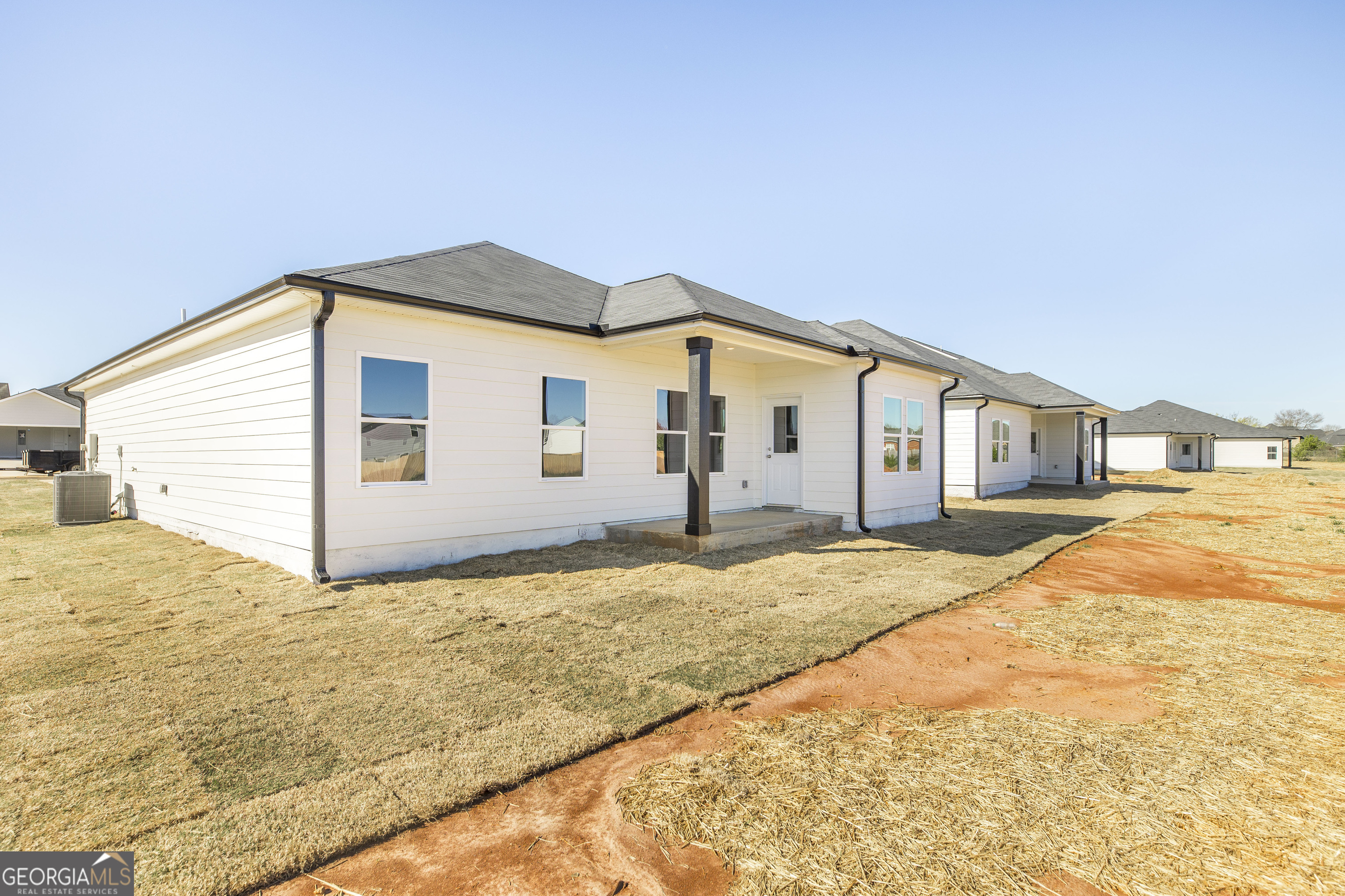 502 Georgian Walk Byron, GA 31008 - Photo 17 of 27 a bathroom with a sink and snow on the wall
