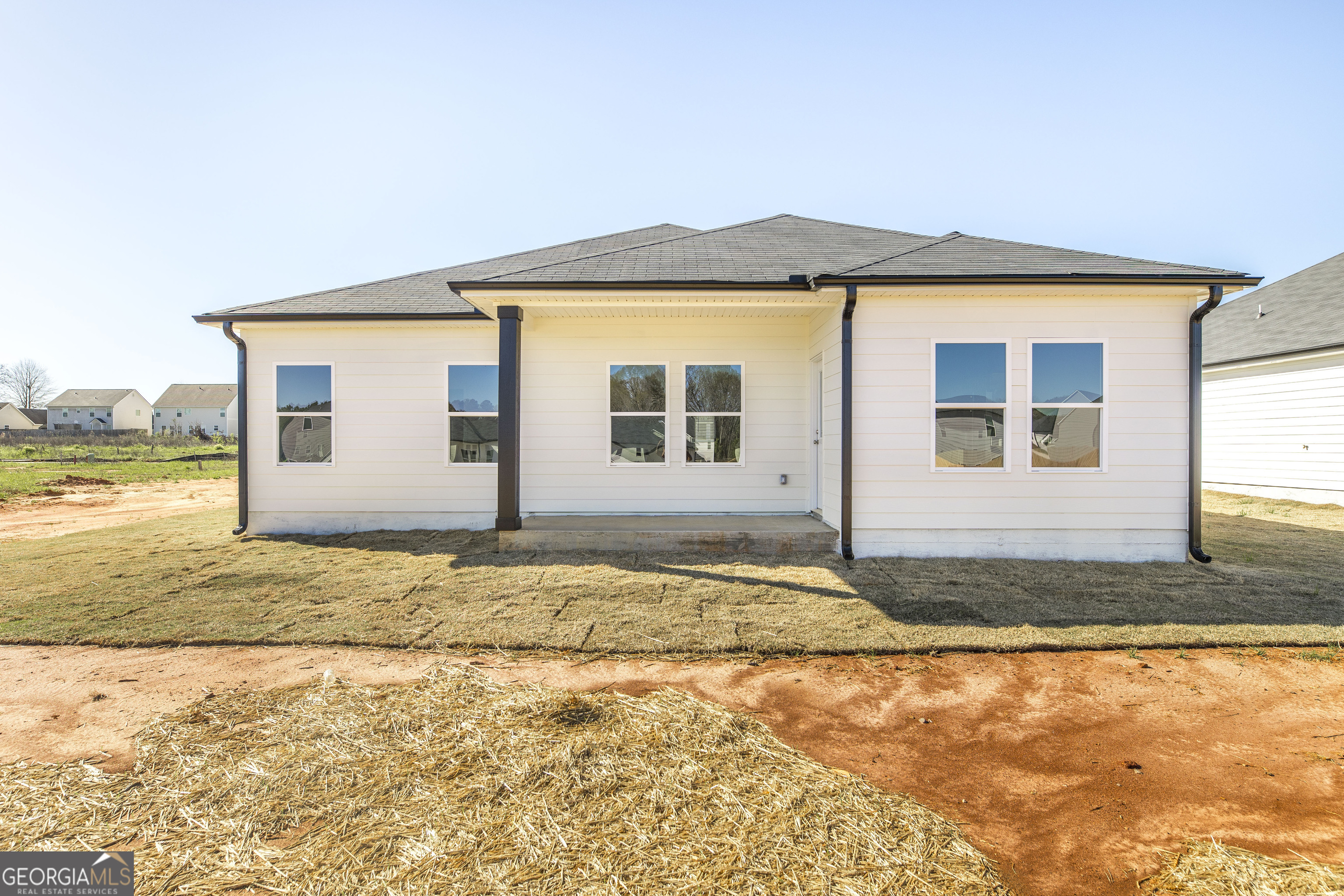 502 Georgian Walk Byron, GA 31008 - Photo 21 of 27 a view of a house with a ocean view
